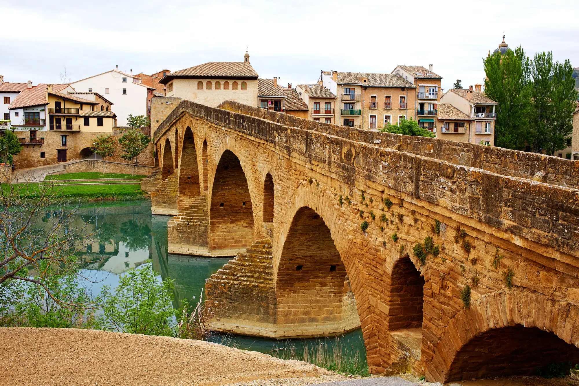 A medieval bridge over the city leading to the city